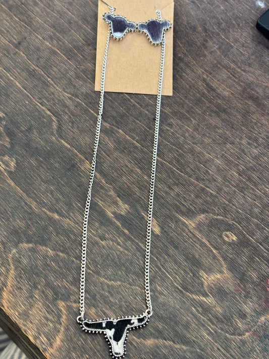 black/white cow head necklace and earring set